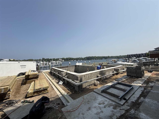 107 Belvedere Ave Unit A-3, Charlevoix, MI 49720 - view of patio featuring a boat ramp