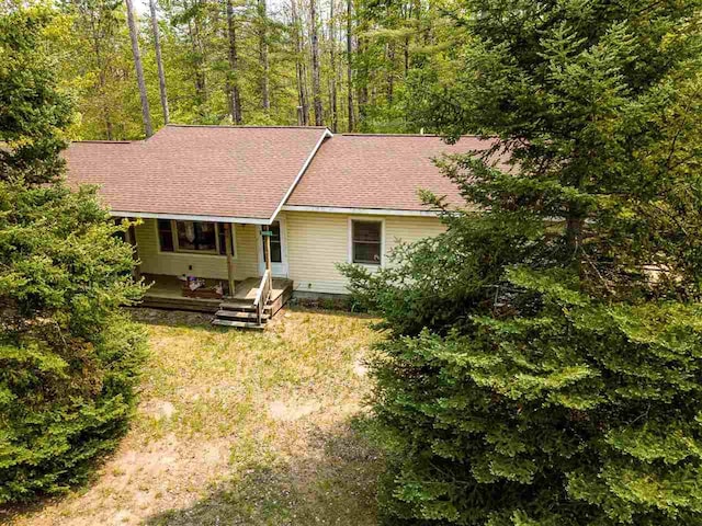 2335 Lone Pine Rd, Gaylord, MI 49735 - view of front of home featuring covered porch