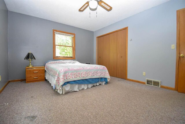 2335 Lone Pine Rd, Gaylord, MI 49735 - bedroom featuring carpet flooring, a closet, and ceiling fan