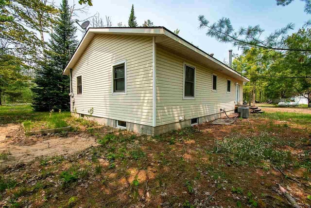 2335 Lone Pine Rd, Gaylord, MI 49735 - view of side of property with a cooling unit