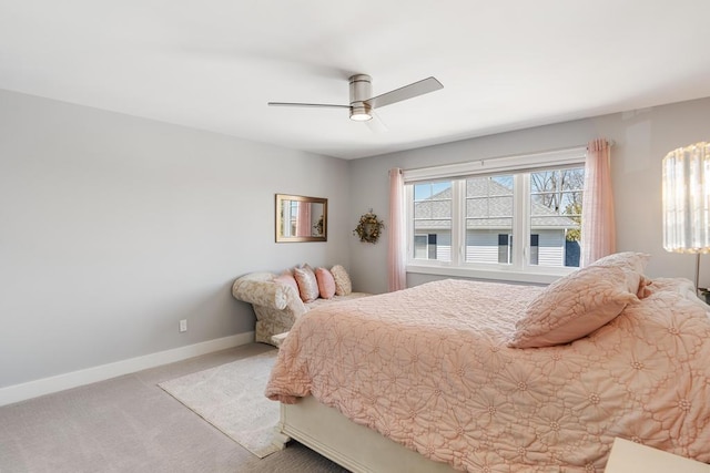135 Beaubien Ave, Petoskey, MI 49770 - carpeted bedroom with baseboards and a ceiling fan