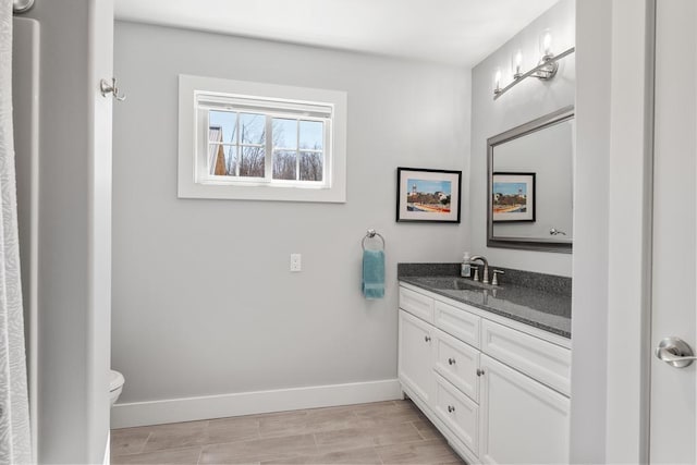 135 Beaubien Ave, Petoskey, MI 49770 - bathroom featuring vanity and baseboards
