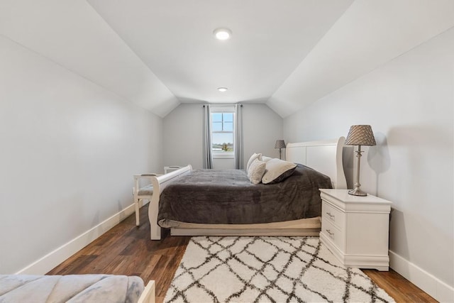 135 Beaubien Ave, Petoskey, MI 49770 - bedroom featuring vaulted ceiling and wood finished floors