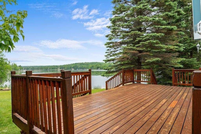 15700 Island Dr, Wolverine, MI 49799 - wooden terrace featuring a water view