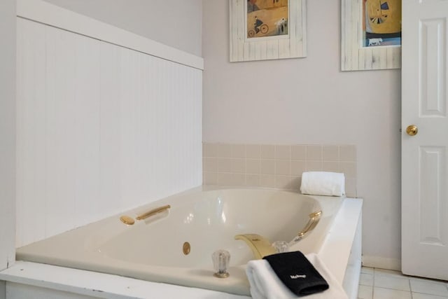 101 Michigan Ave Unit 107, Charlevoix, MI 49720 - full bathroom featuring a whirlpool tub and tile patterned floors
