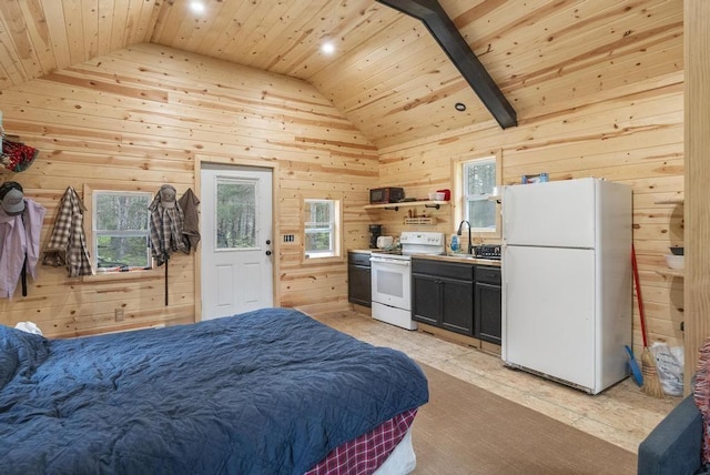 168 Townline Rd, Pellston, MI 49769 - bedroom featuring freestanding refrigerator, wooden ceiling, lofted ceiling, wood walls, and multiple windows