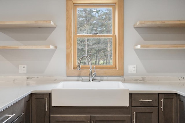 168 Townline Rd, Pellston, MI 49769 - kitchen with open shelves, dark brown cabinetry, and light countertops