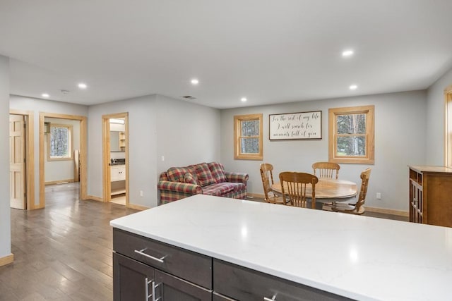 168 Townline Rd, Pellston, MI 49769 - kitchen with recessed lighting, light countertops, wood finished floors, and dark brown cabinetry