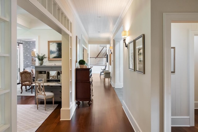 145 Traverse St, Harbor Springs, MI 49740 - hallway featuring dark wood-style floors, ornamental molding, and stairway
