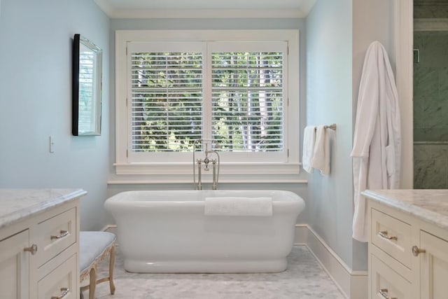 145 Traverse St, Harbor Springs, MI 49740 - full bath with vanity, a soaking tub, an enclosed shower, and crown molding