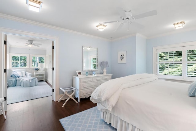 145 Traverse St, Harbor Springs, MI 49740 - bedroom featuring dark wood-style floors, crown molding, and a ceiling fan