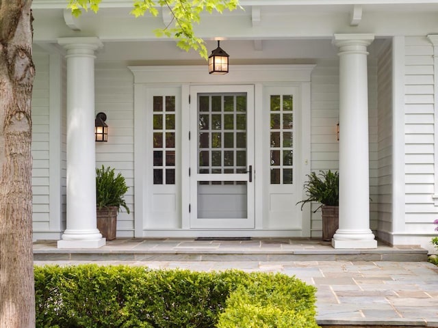 145 Traverse St, Harbor Springs, MI 49740 - property entrance with a porch