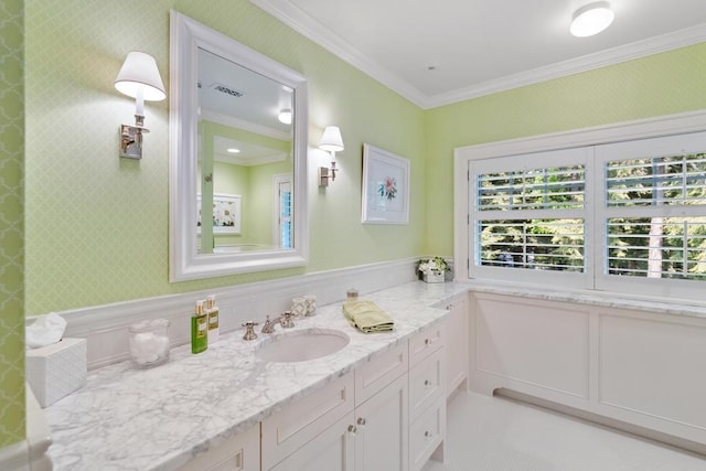 145 Traverse St, Harbor Springs, MI 49740 - bathroom featuring vanity, ornamental molding, and wallpapered walls