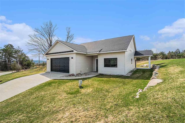705 Maple Crk, Petoskey, MI 49770 - modern inspired farmhouse featuring a garage, driveway, a front yard, and a shingled roof