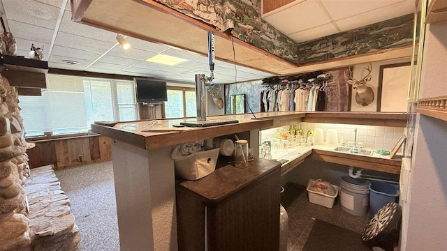 2160 Kladder Rd, Bellaire, MI 49615 - indoor bar featuring a paneled ceiling