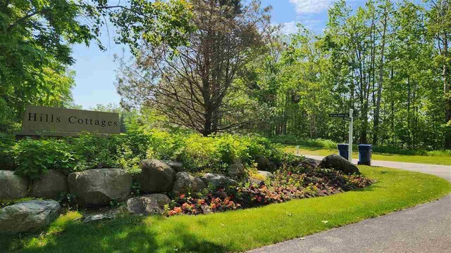 6069 Hills Cottage Ct Unit 5, Bay Harbor, MI 49770 - view of community / neighborhood sign