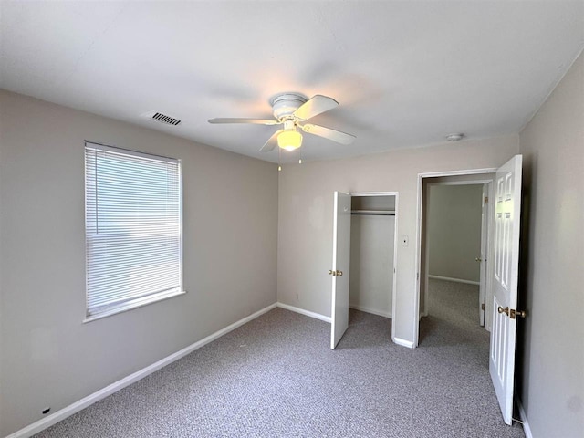 2343 Bonner Rd, Ferndale, MI 48220 - unfurnished bedroom featuring carpet, a closet, and a ceiling fan
