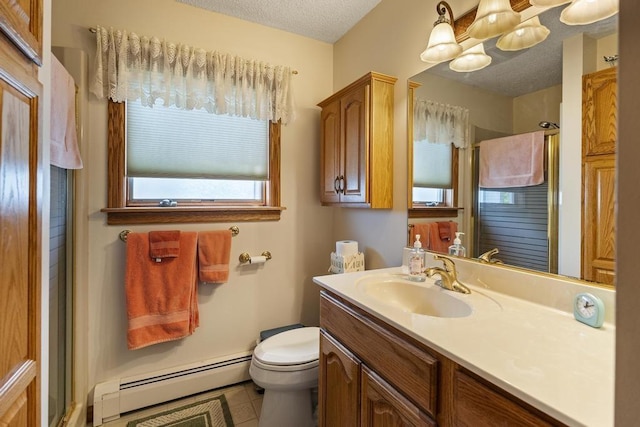 6989 Meadowlark Way, Gaylord, MI 49735 - bathroom with a baseboard heating unit, a shower with door, vanity, a textured ceiling, and tile patterned floors