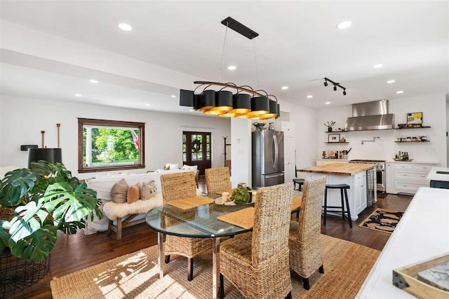 606 State St, Petoskey, MI 49770 - dining area with dark wood-type flooring and recessed lighting