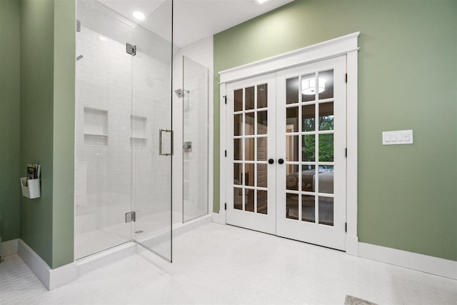606 State St, Petoskey, MI 49770 - full bath featuring french doors and a stall shower