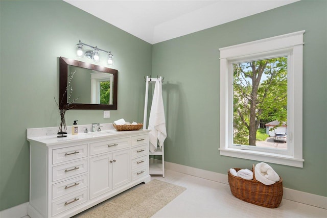 606 State St, Petoskey, MI 49770 - bathroom with vanity and healthy amount of natural light