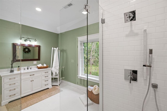 606 State St, Petoskey, MI 49770 - bathroom with vanity and recessed lighting