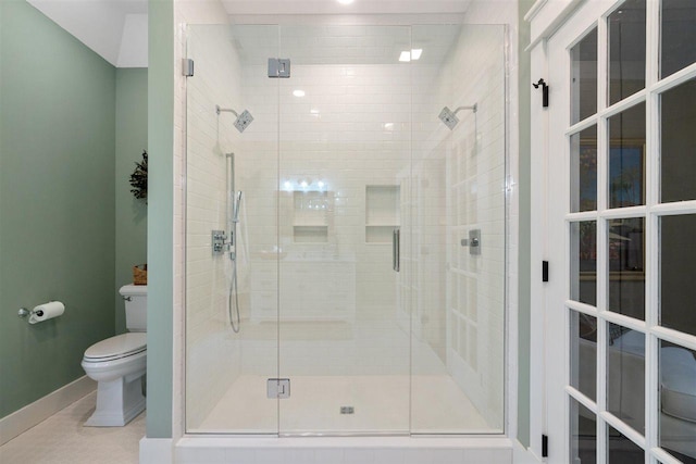 606 State St, Petoskey, MI 49770 - bathroom featuring toilet and a stall shower