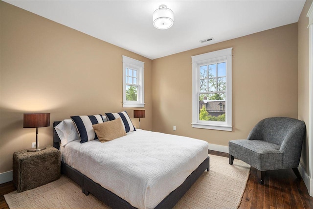606 State St, Petoskey, MI 49770 - bedroom featuring wood finished floors