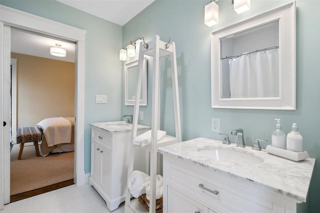 606 State St, Petoskey, MI 49770 - full bathroom with two vanities and ensuite bathroom