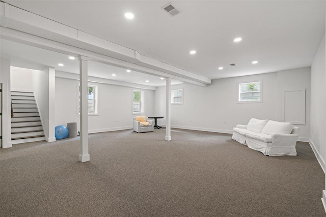 606 State St, Petoskey, MI 49770 - basement featuring recessed lighting, carpet flooring, stairway, and plenty of natural light