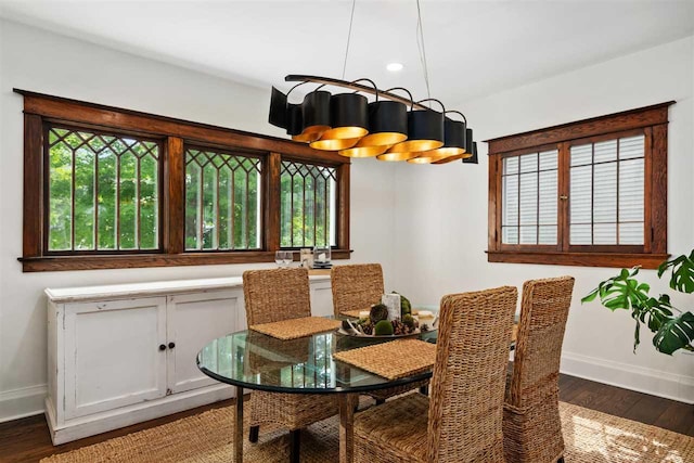 606 State St, Petoskey, MI 49770 - dining room featuring baseboards and wood finished floors
