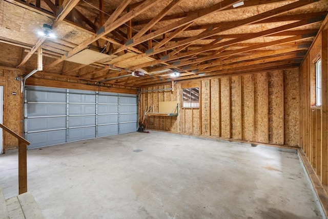 3049 Chippewa Beach Rd, Indian River, MI 49749 - garage with a garage door opener