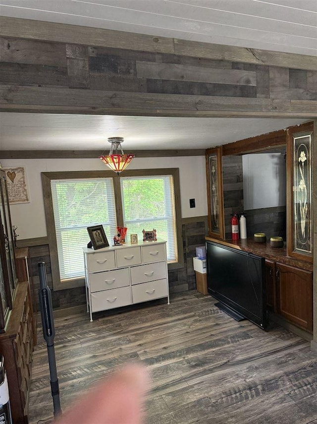 6515 Pincherry Rd, Charlevoix, MI 49720 - interior space featuring dark wood-style floors and a wainscoted wall