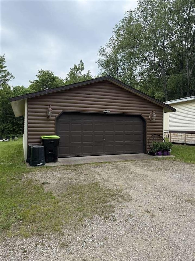 6515 Pincherry Rd, Charlevoix, MI 49720 - view of garage