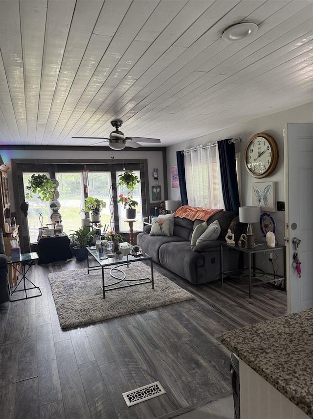 6515 Pincherry Rd, Charlevoix, MI 49720 - living area with a ceiling fan and hardwood / wood-style flooring
