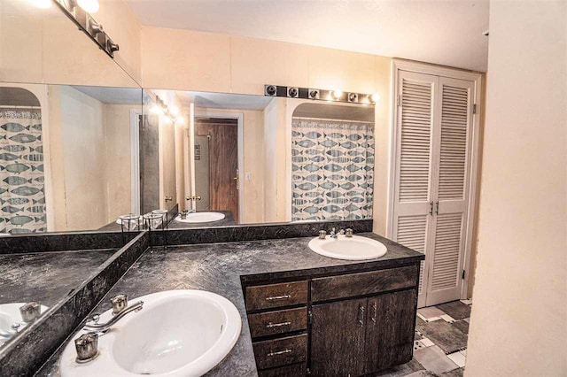 5272 Indian Garden Rd, Petoskey, MI 49770 - full bath featuring a closet and double vanity