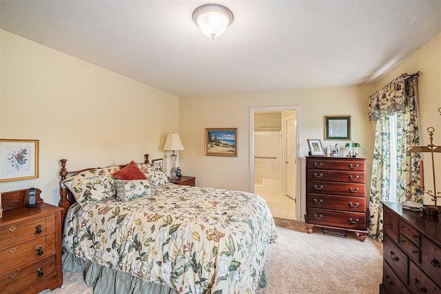 7879 Bay Meadow Dr, Harbor Springs, MI 49740 - bedroom with light carpet and ensuite bath