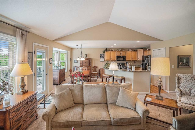 7879 Bay Meadow Dr, Harbor Springs, MI 49740 - living area with vaulted ceiling and baseboards