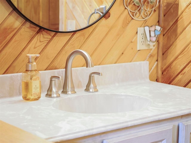 1922 Freeman Rd, East Jordan, MI 49727 - bathroom view of vanity and wood walls