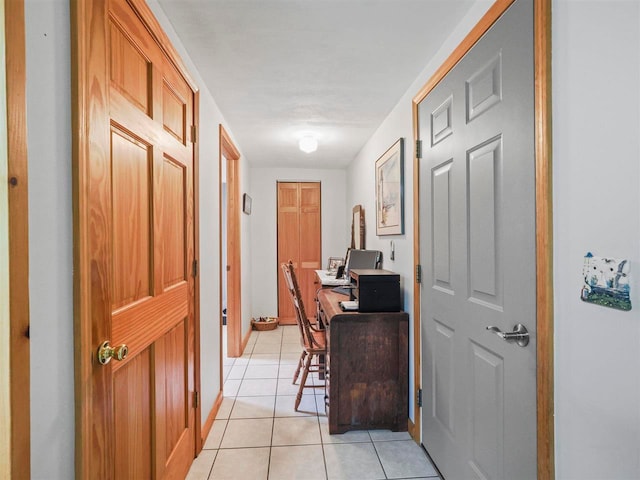 1922 Freeman Rd, East Jordan, MI 49727 - hall featuring light tile patterned floors and an office area