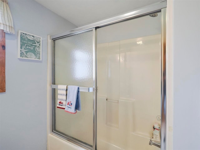 1922 Freeman Rd, East Jordan, MI 49727 - full bathroom with shower / bath combination with glass door