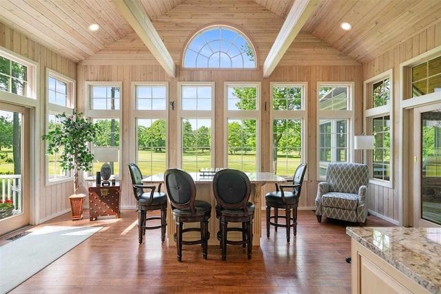 690 Woodhill Unit 6, Harbor Springs, MI 49740 - sunroom / solarium with plenty of natural light, wood-type flooring, a deck, wood ceiling, and wood walls