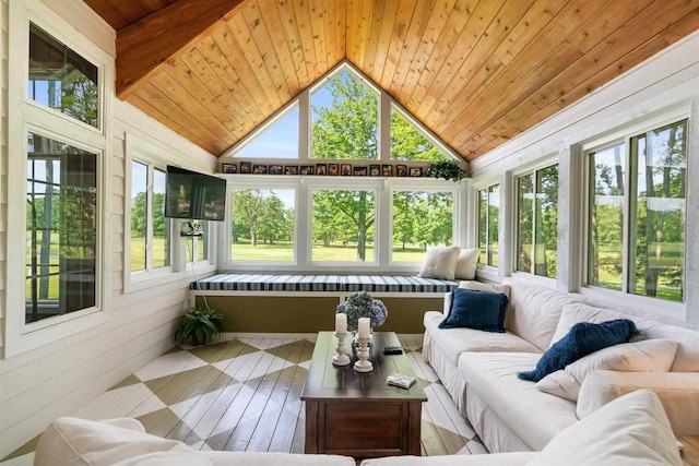 690 Woodhill Unit 6, Harbor Springs, MI 49740 - sunroom / solarium with an outdoor hangout area and vaulted ceiling