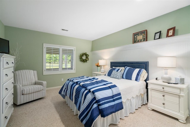 690 Woodhill Unit 6, Harbor Springs, MI 49740 - bedroom with light carpet