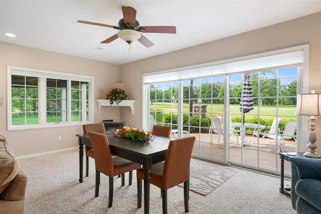 690 Woodhill Unit 6, Harbor Springs, MI 49740 - dining space featuring light carpet, plenty of natural light, ceiling fan, and recessed lighting