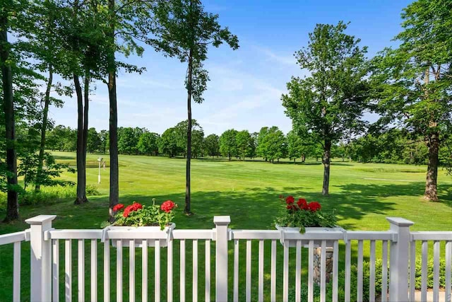 690 Woodhill Unit 6, Harbor Springs, MI 49740 - view of yard featuring view of wooded area