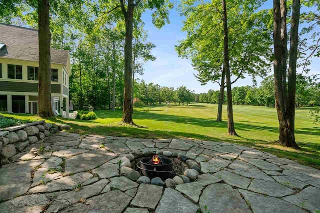 690 Woodhill Unit 6, Harbor Springs, MI 49740 - view of patio with an outdoor fire pit