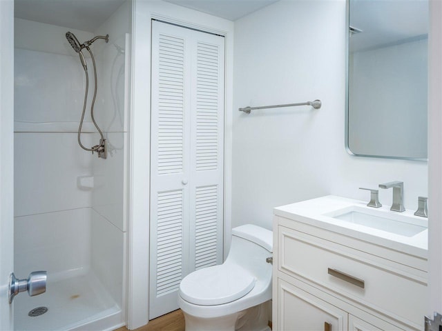 528 E Bay St Unit 30, Harbor Springs, MI 49740 - bathroom featuring a closet, vanity, and a shower