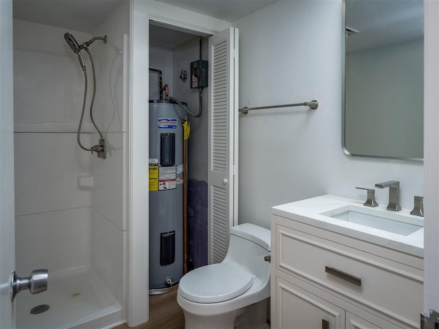 528 E Bay St Unit 30, Harbor Springs, MI 49740 - bathroom with electric water heater, a stall shower, and vanity