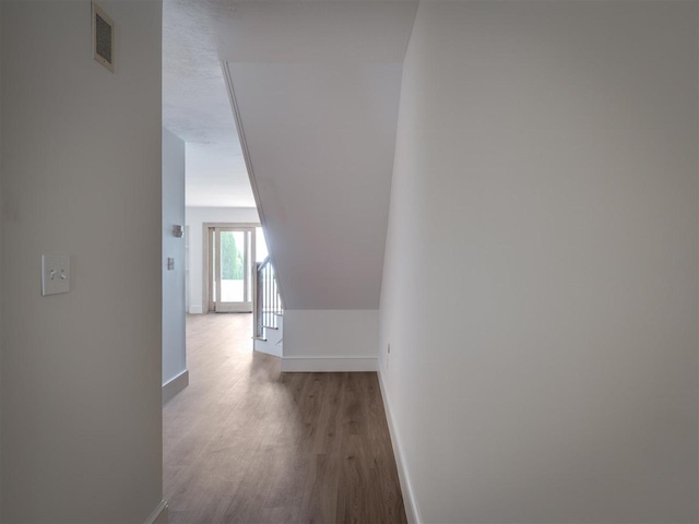 528 E Bay St Unit 30, Harbor Springs, MI 49740 - corridor with baseboards and wood finished floors